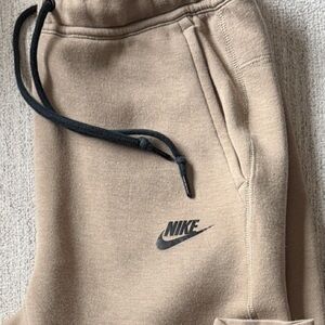 Nike Tech Fleece Beige Sweatpants with Black Emblem  Ex condition.
